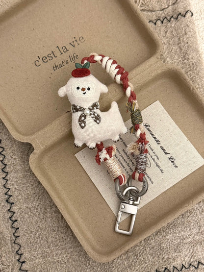 Handmade lamb charm with red apple detail