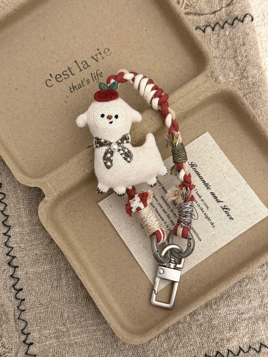 Handmade lamb charm with red apple detail