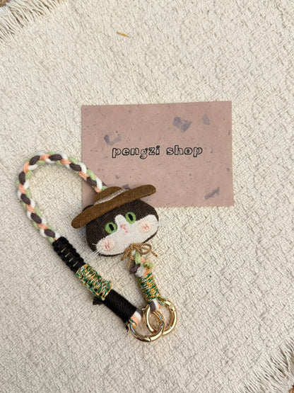 Handmade nomad cat charm with braided strap